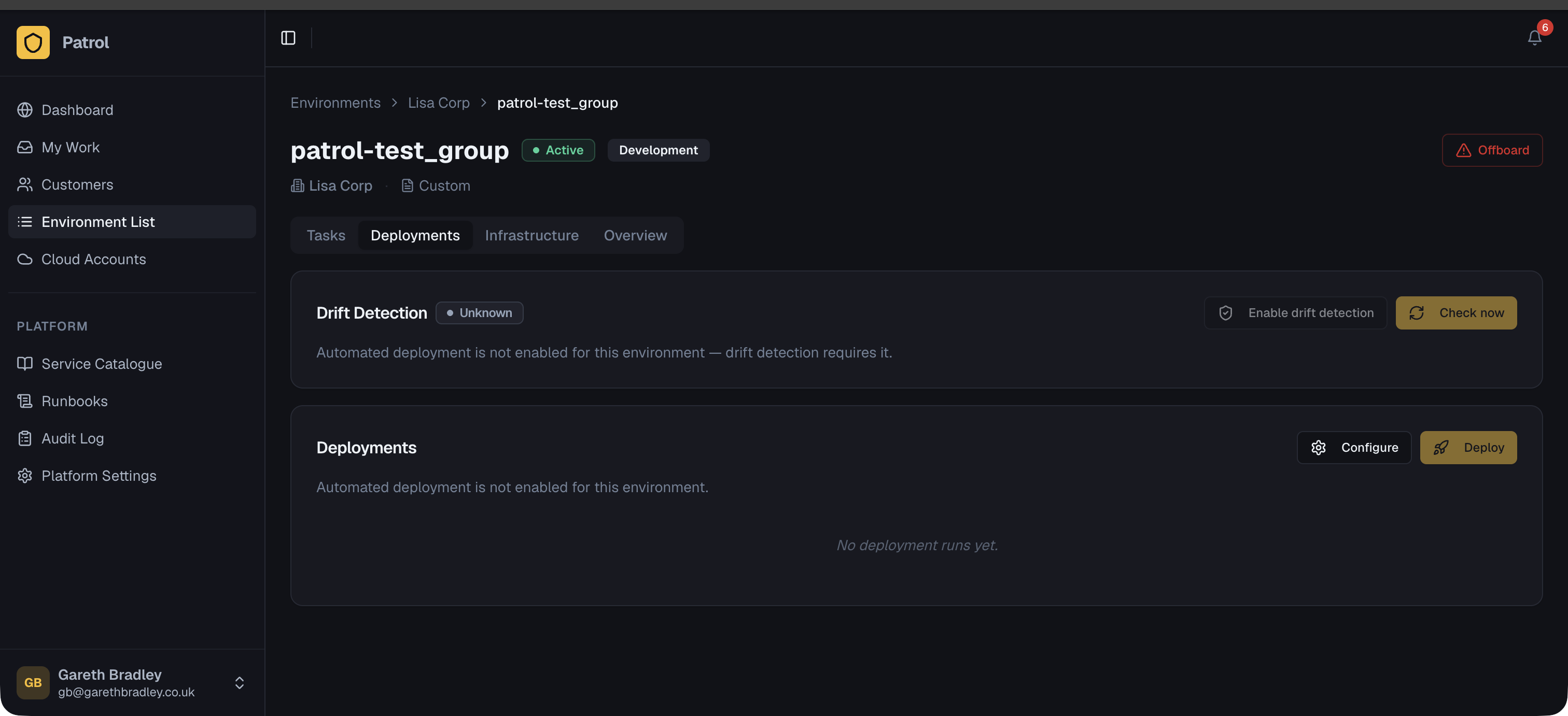 Environment detail page with the Deployments panel open, showing a Deploy button, run history with status badges, and a Configure button
